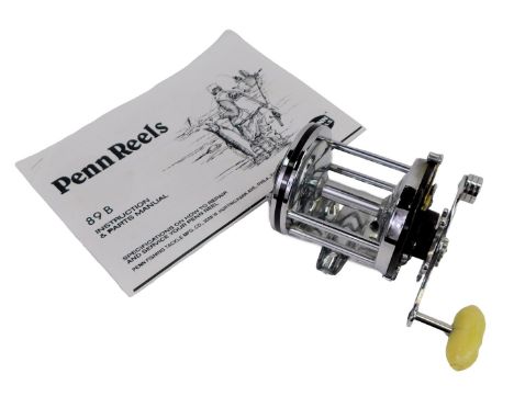 A Penn Squidder fishing reel, number 145, with instruction and parts manual.