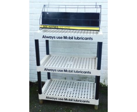 A Mobil Lubricants three tier plastic shelving unit, 92cm high, 74cm wide, 42cm deep, together with a Haynes shelving rack, 6