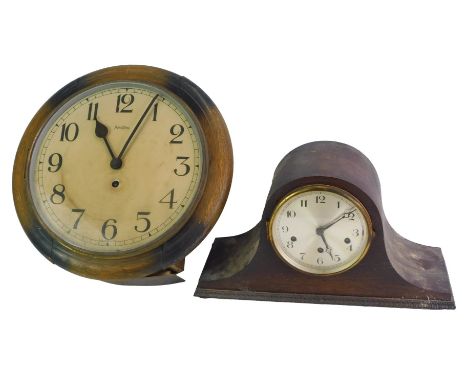 A Bentima oak cased wall clock, the circular dial bearing Arabic numerals, thirty hour movement, 39cm diameter, together with