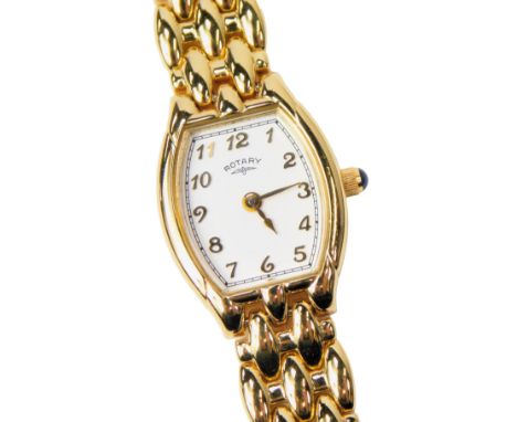 A Rotary lady's gold plated wristwatch, with an oblong dial bearing Arabic numerals, cabochon set winder, on an integral brac