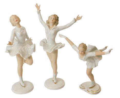 Three Wallendorf porcelain figures modelled as ice skaters, in differing poses, the largest 24cm high. (AF)