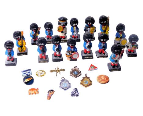 A Robertson's figural band set, together with lollipop lady, enamel and other badges, etc. (1 tray) 