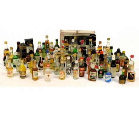 A group of alcohol miniatures, including Glenfiddich, Johnnie Walker Black Label, gin, rum and others. (1 tray)