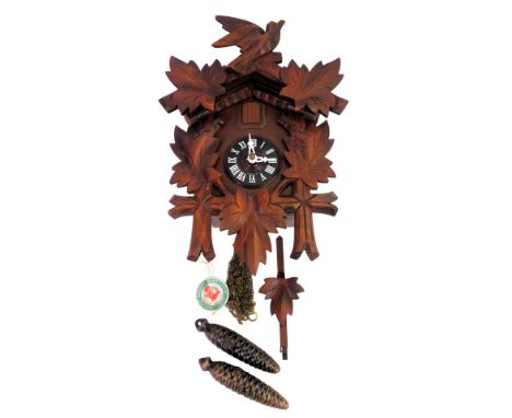 A German Black Forest style cuckoo clock, 27cm high. 