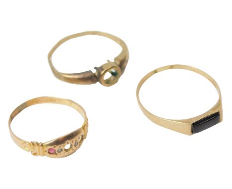 A 9ct gold and black onyx lady's signet ring, size T, 1.1g, a 15ct gold ring, set with one ruby and two diamonds, two rubies 
