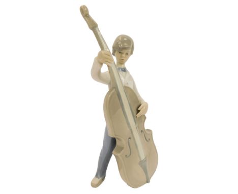 A Lladro porcelain figure, modelled as a boy playing a cello, printed marks, 25cm high.