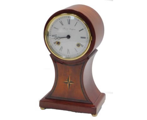 A Franz Hermle mahogany and inlaid balloon shaped mantel clock, the circular white enamel dial bearing Roman numerals for Fox