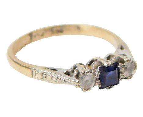 A sapphire and cz three stone ring, high claw set, stamped 9ct, size K, 1.8g. 