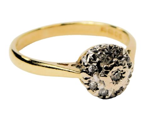 An 18ct gold and diamond flower head ring, in a basket setting, size K, 3.0g. 
