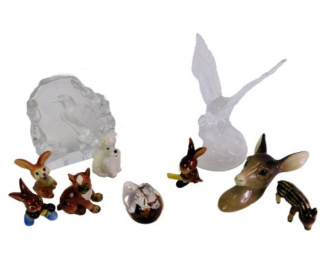 A group of collectables, to include a moulded glass eagle paperweight, 20cm high, Goebel porcelain figure modelled as a Poodl