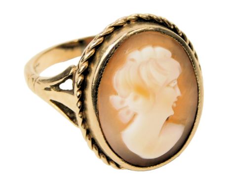 A cameo ring, bust portrait of a lady, in an oval setting, yellow metal stamped 9ct, size K, 4.2g. 