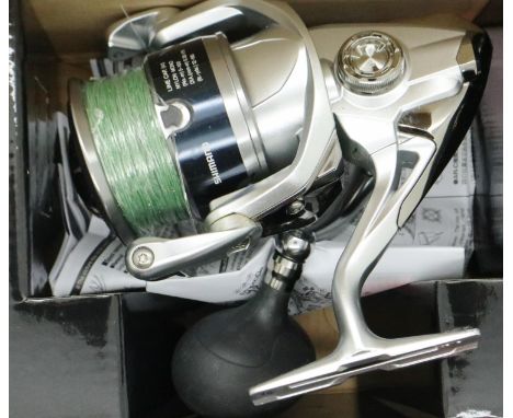 Boxed Shimano C5000XG reel in very good condition. P&amp;P Group 1 (£14+VAT for the first lot and £1+VAT for subsequent lots)