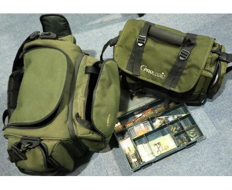 Fox Evolution tackle bag with tackle box to base and a Pro Logic tackle bag, with damages. P&amp;P Group 3 (£25+VAT for the f