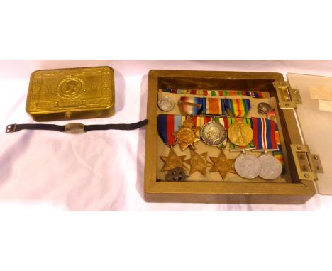 WWI medal pair and Mons star, to 75879 GNR J Frahill RFA together with his WWII medals and stars and WWII medal, box of issue