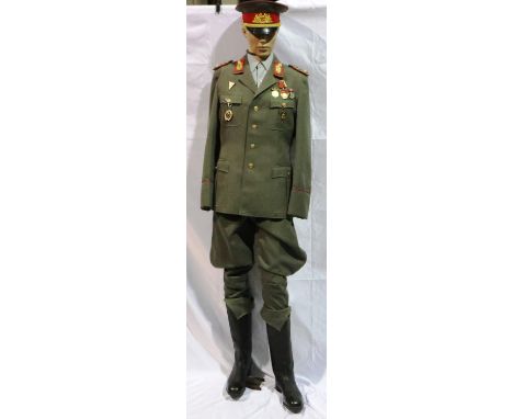 Rare East German Army Generals uniform, comprising tunic, breeches, boots, shirt and visor cap. P&amp;P Group 3 (£25+VAT for 