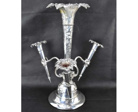 A late 19th century Victorian hallmarked silver three-branch epergne, the tall central trumpet with grapes and vine rim, bows