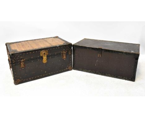 A vintage metal trunk with leather carrying handles and later wood-effect vinyl applied to lid, 39 x 74 x 47cm and an example