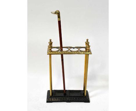 A brass umbrella and stick stand with four compartments, on a metal base with recessed drip trays, height 65cm, together with