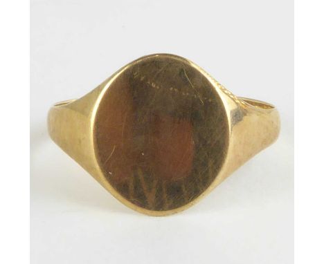 A 9ct gold signet ring with blank table, size W, approx. 2.3g.