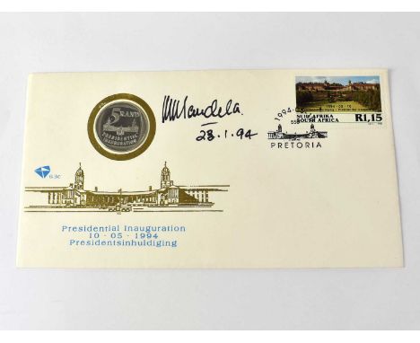 NELSON MANDELA; a first day cover with five rand coin bearing the signature of the South African president dated 23.1.94.Cond