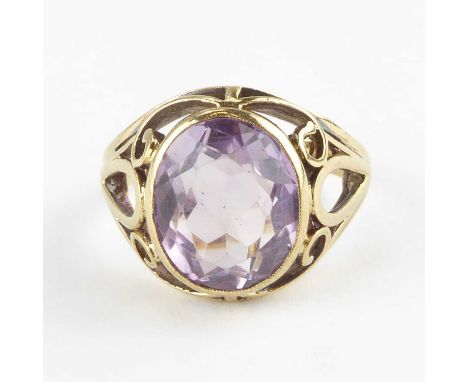 A 9ct gold amethyst dress ring with scroll open shoulders, size P, approx. 4.7g.