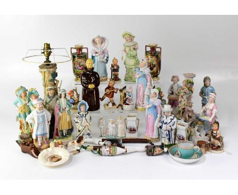 A collection of mostly Continental bisque figures, also a table lamp, various Goebel figures, a pair of Vienna gilt-heightene