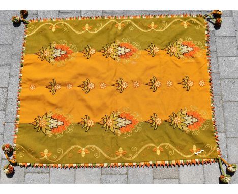 Three vintage and antique tablecloths to include an Arts and Crafts style hand-stitched and embroidered table cover, the cent