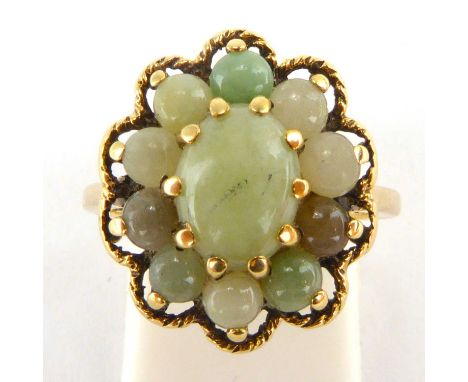 A 9ct gold cluster ring, set with polished jade-style beads in a flower head border, size M, approx. 3.7g.