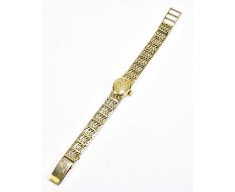 ROTARY; a ladies' 9ct gold wristwatch, with pierced 9ct strap, the oval dial set with baton numerals, diameter excluding wind