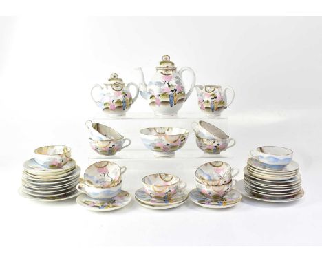 A Japanese eggshell tea service for eight place settings.
