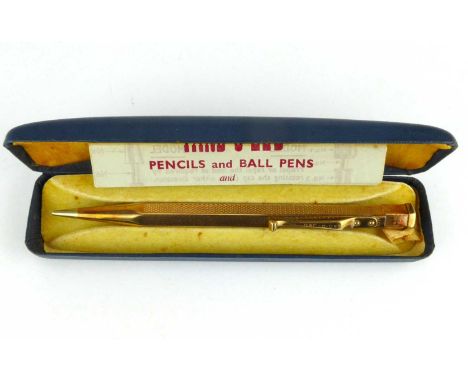 A 9ct gold cased Yard-O-Led mechanical propelling pencil with engine turned decoration, in presentation case, marked for 9ct,