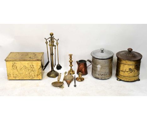 A collection of brassware comprising a companion set on stand, a coal bucket, coal chest with impressed design to lid, and on