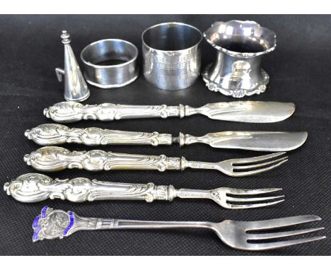 Various items of hallmarked silver to include three non-matching napkin rings, a candle snuffer, two pairs of dessert knives 