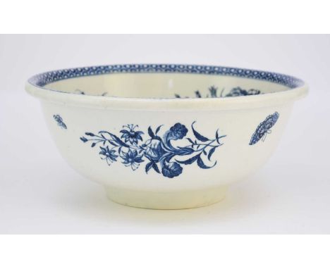 A Worcester 'Pine Cone Group' wash stand basin,circa 1775-80transfer-printed in underglaze blue with the main print to the ce