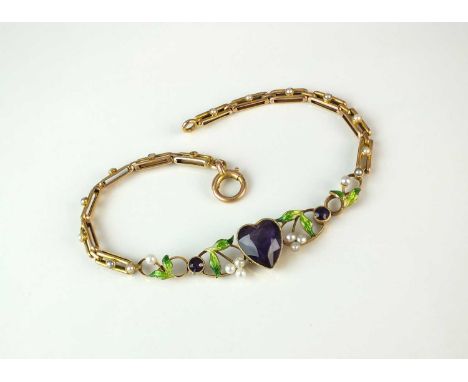 An early 20th century amethyst, seed pearl and green enamel bracelet, in the suffragette colours, designed as a central heart