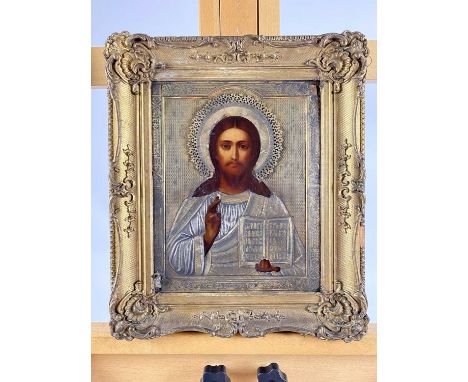 19th Century Russian Icon of Christ Pantocrator, Christ shown blessing the open gospels, oil on panel with gilt white metal o