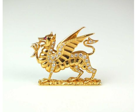 An 18ct gold diamond set Welsh Dragon brooch, the 18ct yellow gold Welsh Dragon set with thirty-two graduated brilliant cut d