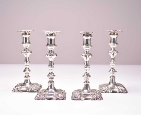 A set of four early Victorian silver candlesticks, Henry Wilkinson &amp; Co, Sheffield 1846, each with knopped stem with remo