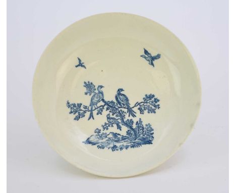 An unusual Caughley 'Birds in Branches' breakfast or saucer dishcirca 1780-85transfer-printed in underglaze blue with the pat