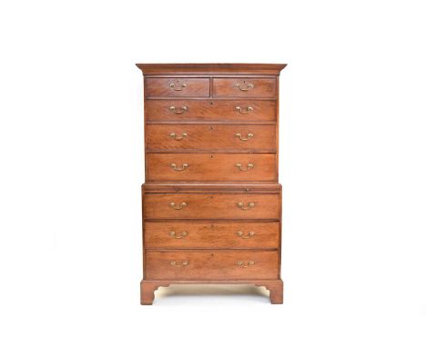 A George III mahogany chest on chestThe upper section with cavetto cornice and two short over three long graduated and cock-b
