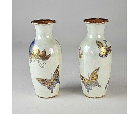 A pair of Wedgwood 'Butterfly' lustre vasescirca 1920sdecorated with butterflies in pastel shades and gilt on a pale mother o