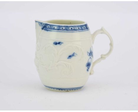 A rare, early Caughley milk jugcirca 1777-82of barrel form with a sparrow beak spout, the strap handle with a scroll terminal