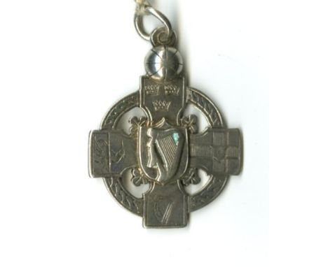 1905 G.A.A. Challenge MatchMedal: G.A.A., 1905  An attractive and unusual cross shaped and pierced silver Medal, the obverse 