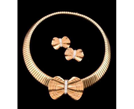 An 18 carat gold and diamond tubogas necklace, clip and ear clips by Weingrill, the gold coloured tubogas necklace with a det