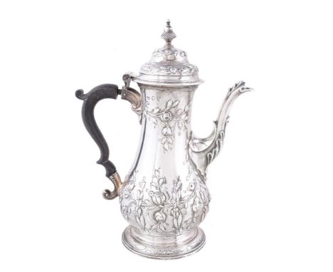 An early George III silver baluster coffee pot by William &amp; James Priest, London 1765, with a wrythen urn finial to the o