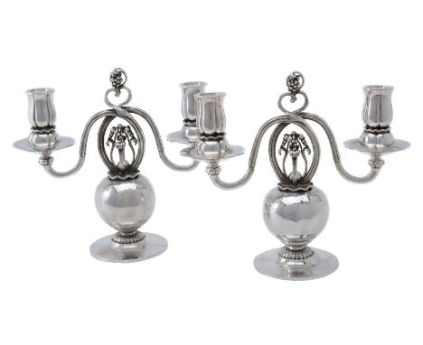 Georg Jensen, a pair of Danish silver Poppy twin light candelabra, post 1945 stamped marks, design no. 324, designed by Georg