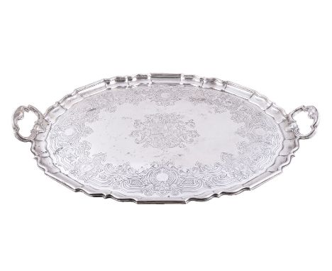 A Victorian silver shaped oval twin handled tray by Garrard &amp; Co., London 1846, stamped for Garrard &amp; Co. as retailer