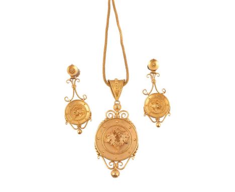 A mid Victorian archaeological revival gold pendant and ear pendants, circa 1870, the pendant with a circular plaque with cen