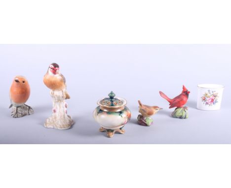 A Royal Worcester porcelain model of a goldfinch, two other Royal Worcester bird models and a Hadley pot pourri painted with 