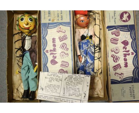 A Pelham puppet "Mr Turnip", in original box, and a companion "Mitzi", in original box